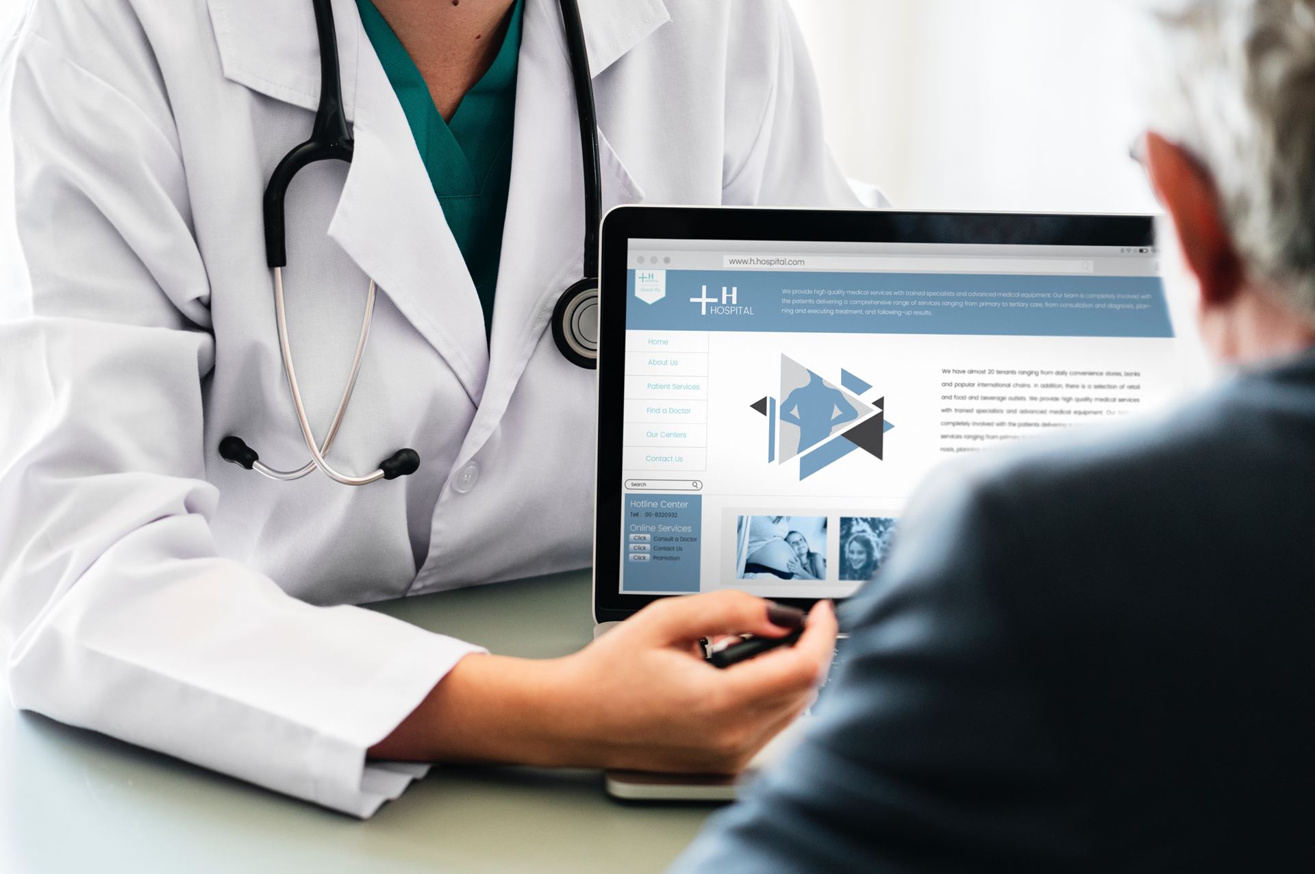 a doctor presenting information on a laptop