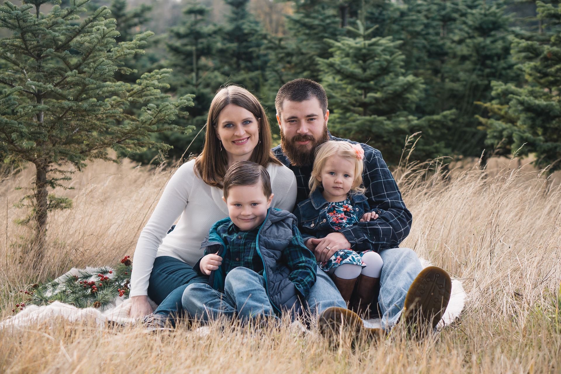 a picture of a family in a field